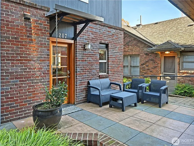 Just outside the kitchen lies this patio space for your own use. The other three residences have their own personal outdoor space so this is just for you.