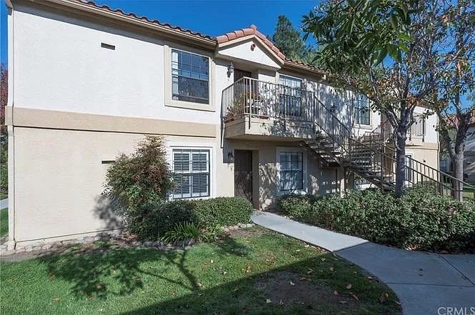 Building Photo - 10311 Azuaga St #45