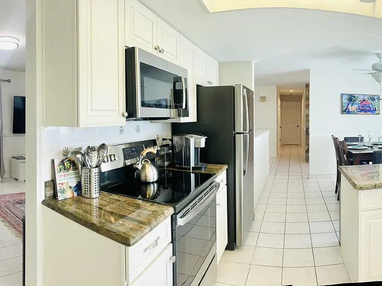 The kitchen is fully-equipped with dishwasher, garbage disposal, coffee machines, toaster, ceramic cook top electric oven, microwave and a big variety of pots, pans and all the cookware necessary to make a gourmet meal.
