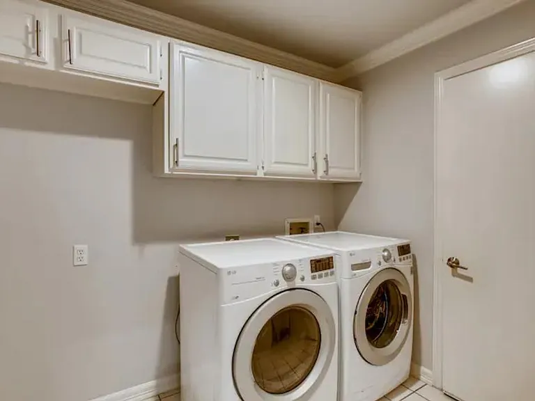 Laundry room with access to the 2 car garage