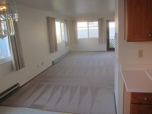 Living room w/ private balcony