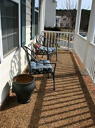 Relax on the front porch overlooking the common area.