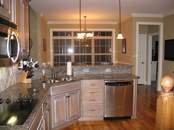Stainless steel, granite, tile backsplash=perfect kitchen
