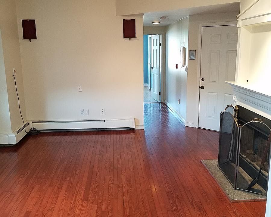 LR with fireplace and view to bedrooms