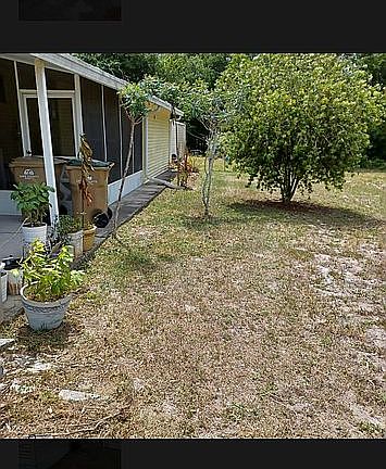 Covered porch-laundry room