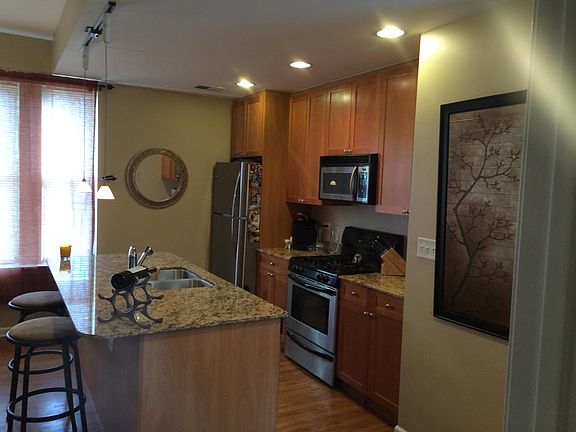 Kitchen-marble countertops and stainless steel appliances