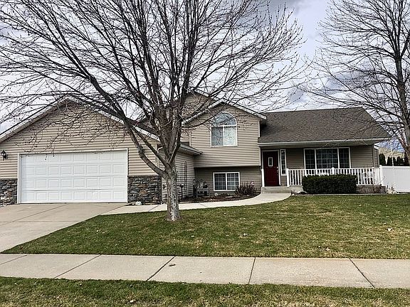 RV parking left of garage.