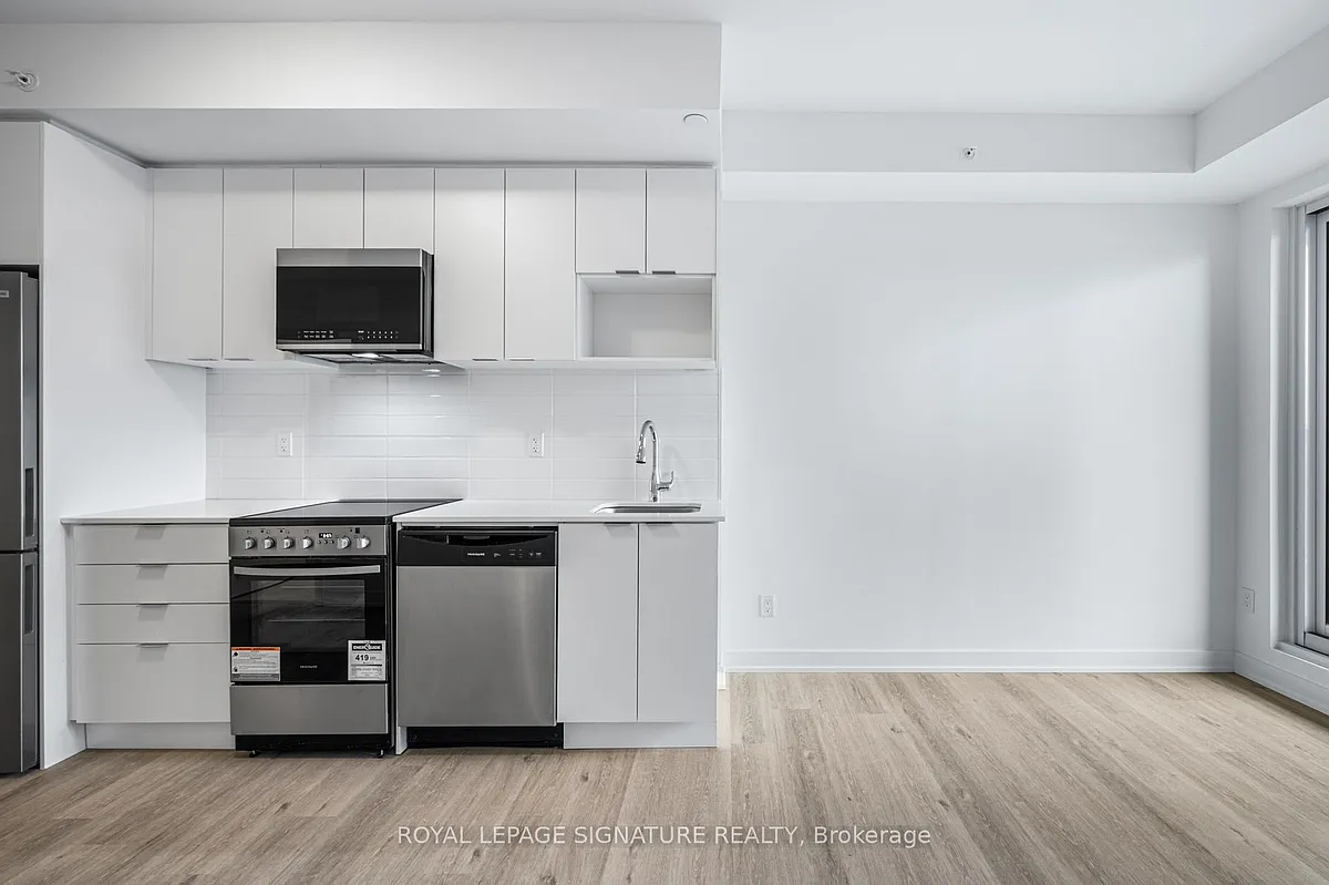 Building Photo - 4569 Kingston Rd #206