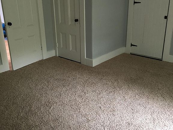 bedroom with closet and crawl space