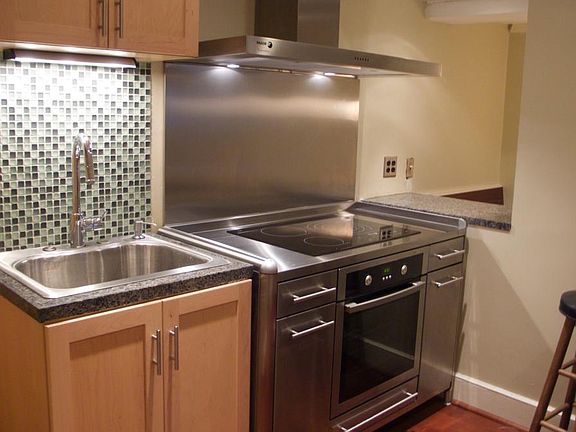 European Kitchen with exterior exhaust fan - now I am not joking - the appliances are European made and perfect for this apartment!