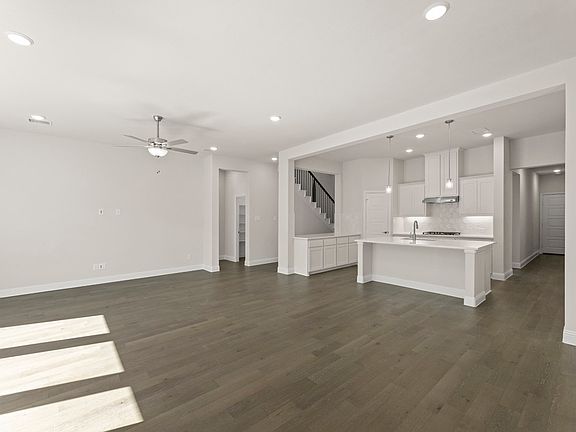 San Martino II floor plan featuring open-concept main-level living, a private study, covered patio,