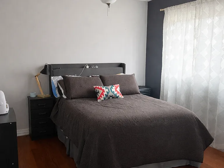 Master bedroom upstairs with walk in closet.