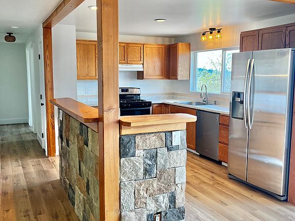 Upstairs kitchen with gas stove