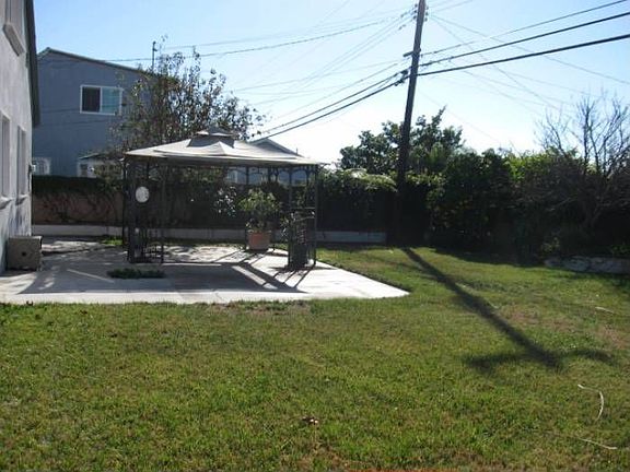 Backyard w/ Iron Canopy