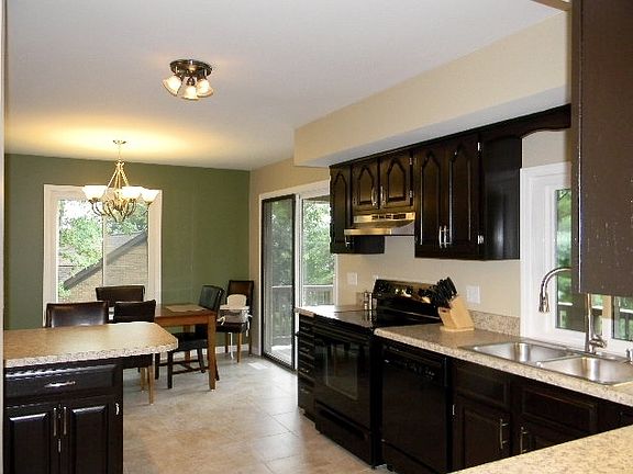 Amazing Kitchen with updated flooring, nice neutral counter tops, freshly stained cabinets etc..