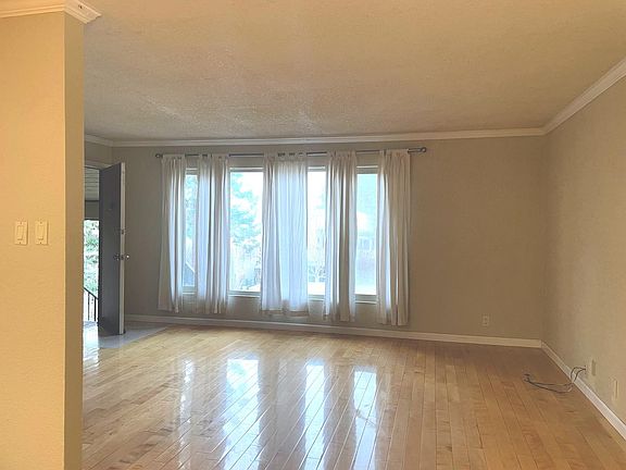 Living room with entry door in view