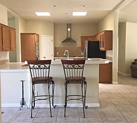 5th image of 8753 E 35th Pl