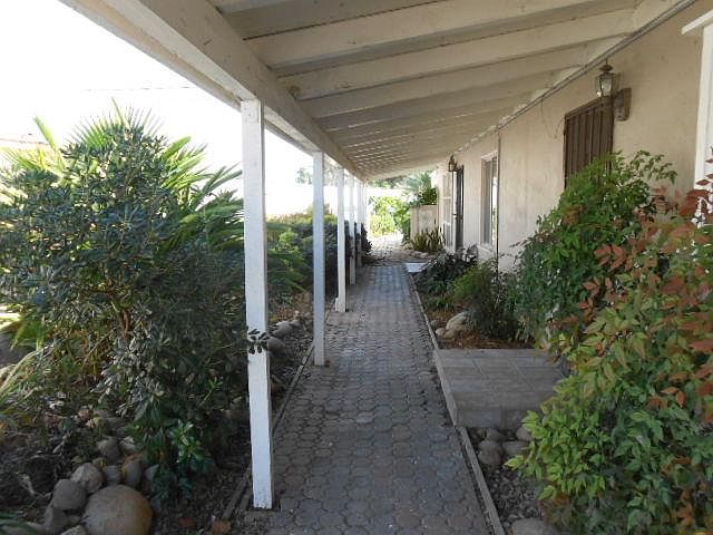 Entrance corridor to front and back units of duplex