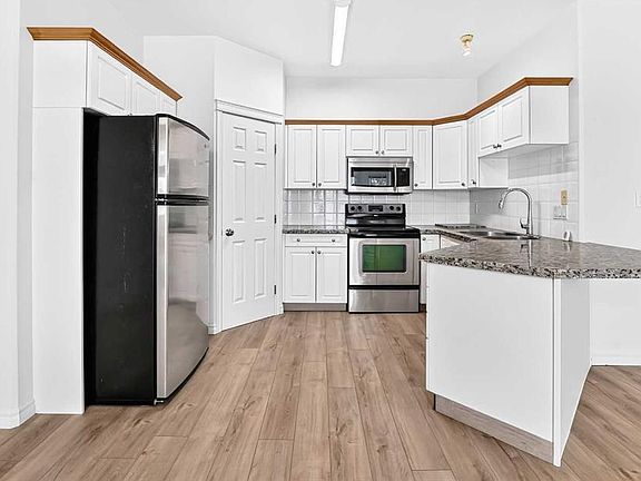 4th image of 7451 S Springbank Blvd SW #1315