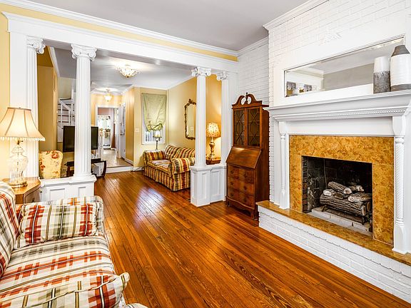 Gorgeous original architectural features - stately columns, original 1910 hardwoods, grand fireplace.