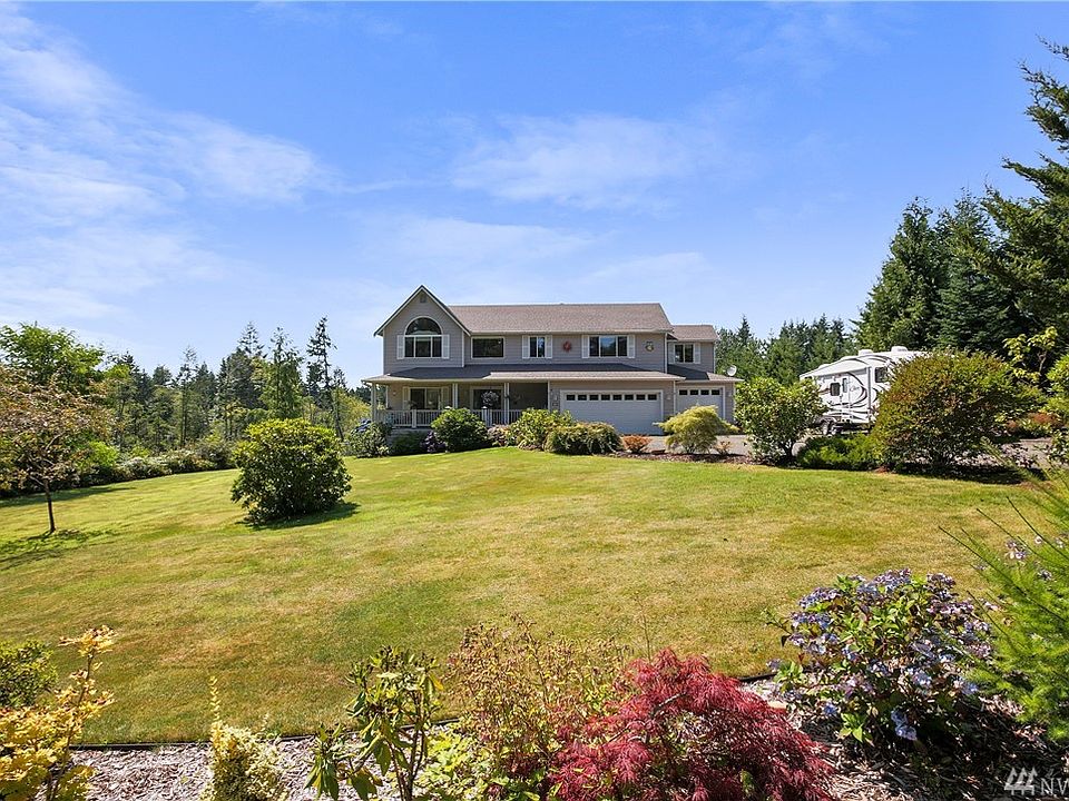 4 bedroom spacious home on 2.47 acres- some lovingly landscaped and some natural