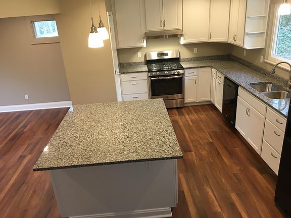 Brand new kitchen with granite countertops. 42 inch soft clo