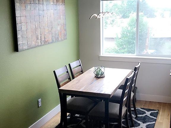 Dining room. Accent wall has been restored to match other walls