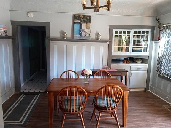 Dinning Room with picture shelf around the whole room!