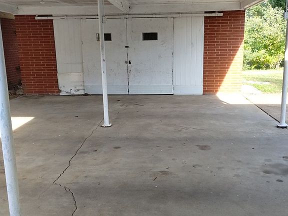 Covered carport, patio & storage