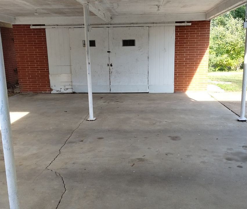 Covered carport, patio & storage