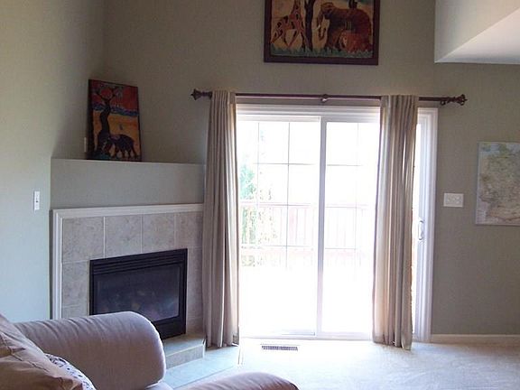 Vaulted family room ceiling, gas fireplace, deck a