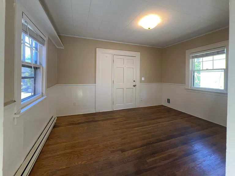 Front Entry and Living Room with original oak floor