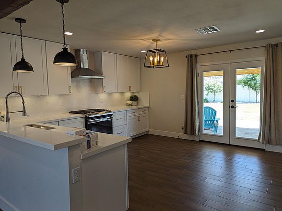 Looking from the living area into the eat-in kitchen.