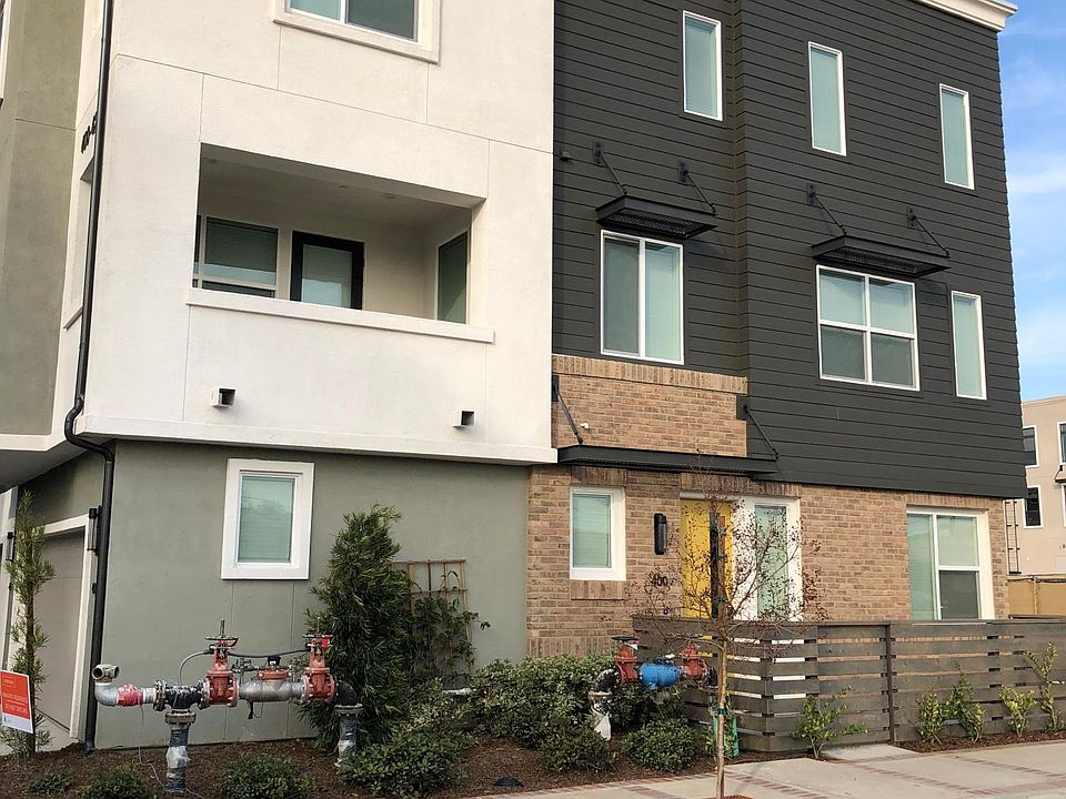 Outside from street showing 2nd floor and first floor patios.