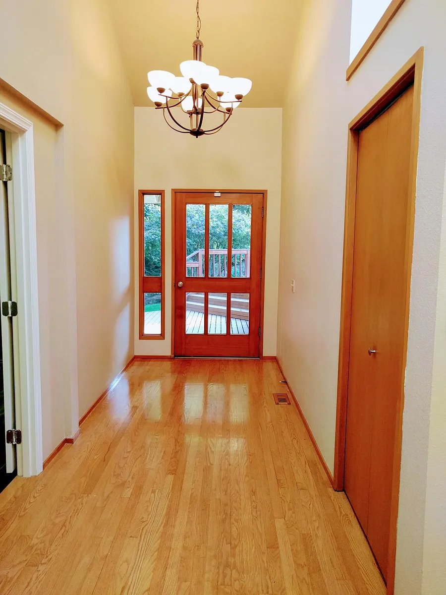 Spacious entryway with closet for coats. - SE 58th Pl