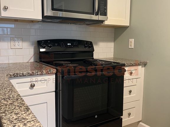 4th image of 214 Barker Ave Side 1