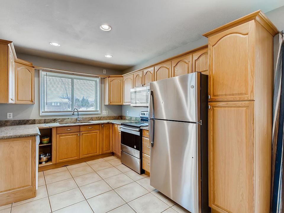 Bright kitchen with new stainless steel appliances