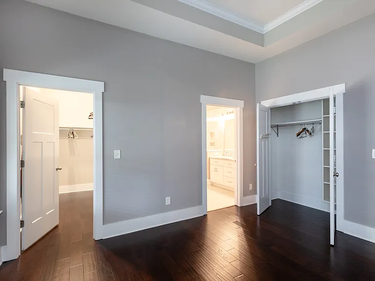 Primary bedroom w/walk-in closet + extra closet