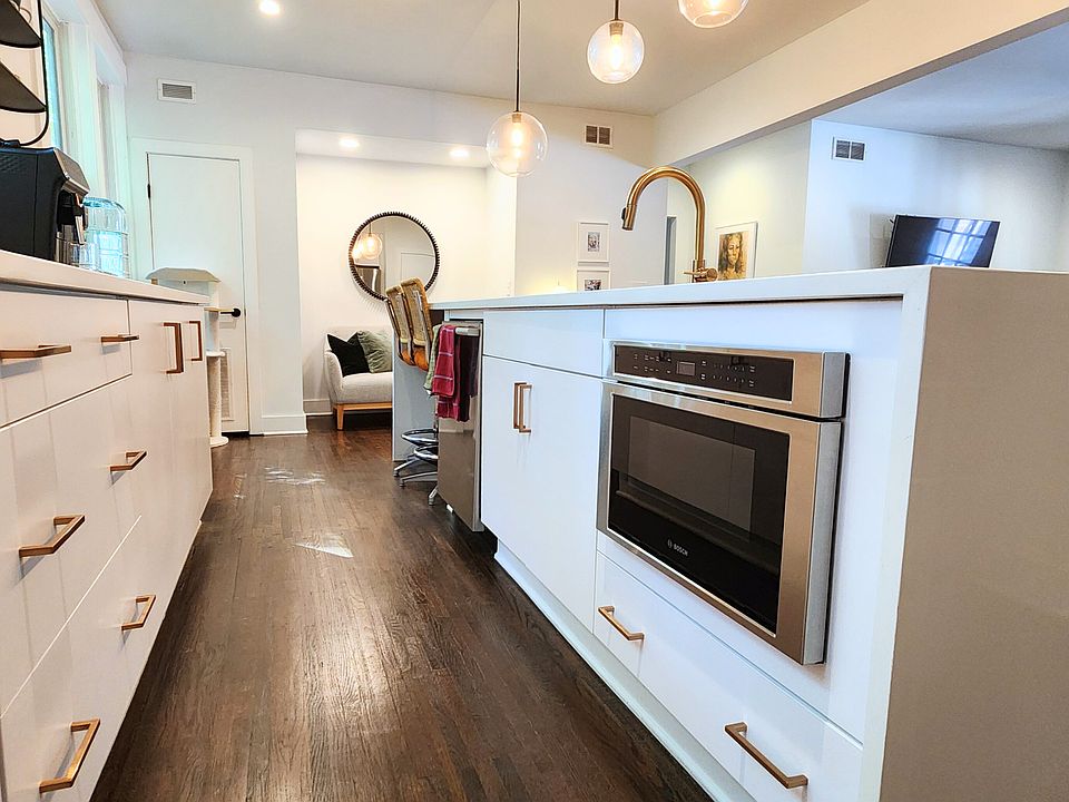 Waterfall island with drawer microwave