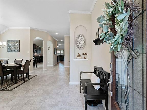 When you walk into the home, you will notice the neutral colors and high ceilings.