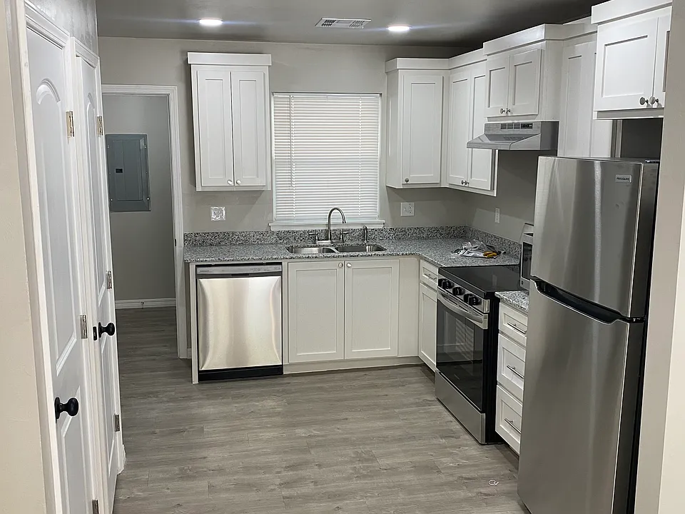 The kitchen has custom made cabinets, several storage spaces and a pantry closet. All appliances seen in the picture included.