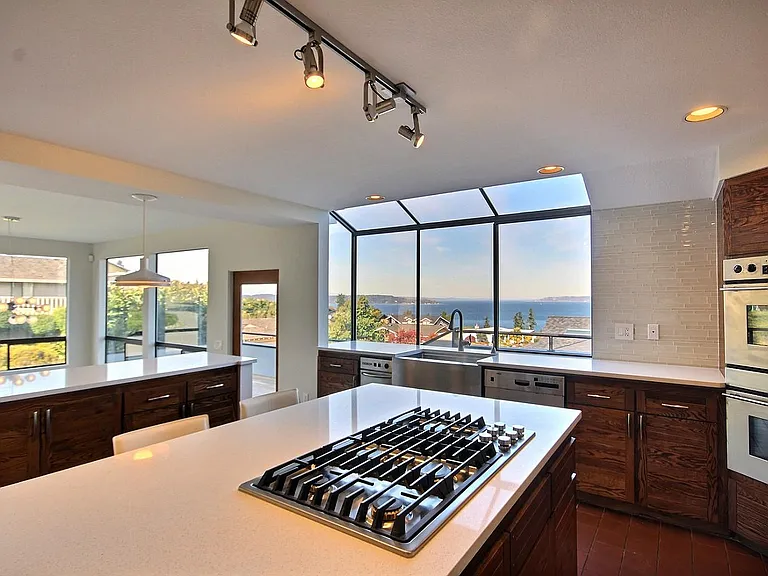 Breathing taking view from almost every room. Newly remodeled house with designer appliances. this is a brand new Jenn-Air down draft 36 inch. 5 burners