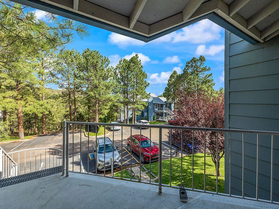 View out to the parking lot from the front balcony. The complex is very clean and quiet.