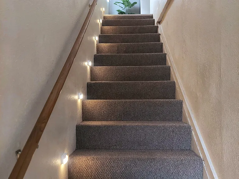 Rechargeable motion sensor stairwell lights.