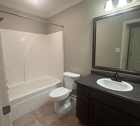 Left side bathroom between the left side bedrooms