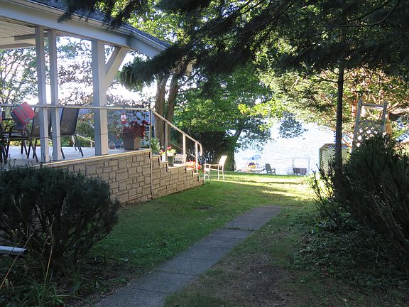 Path from front of house to backyard/lake