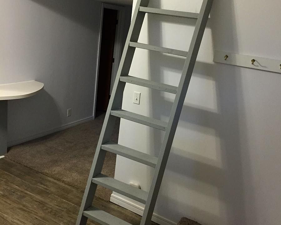 Lofted living and entertainment area off kitchen.