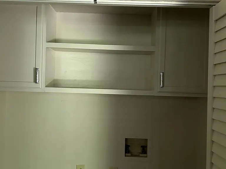 Laundry Room with built-in overhead cabinetry
