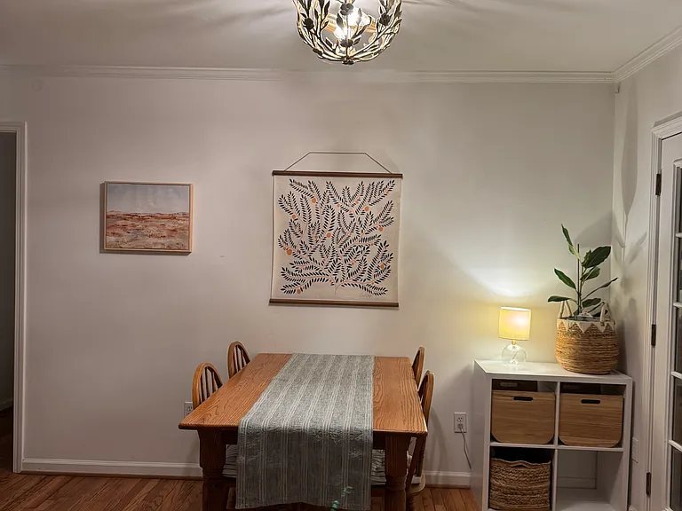 Dinning area off of kitchen. French doors to the right open to backyard.