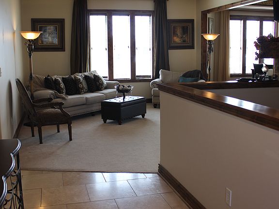 Just inside the front door.